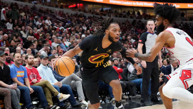 Feb 28, 2024; Chicago, Illinois, USA; Cleveland Cavaliers guard Darius Garland (10) is defended by Chicago Bulls guard Coby White (0) during the second half at United Center.
